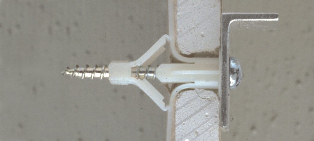 The plastic anchor for drywall